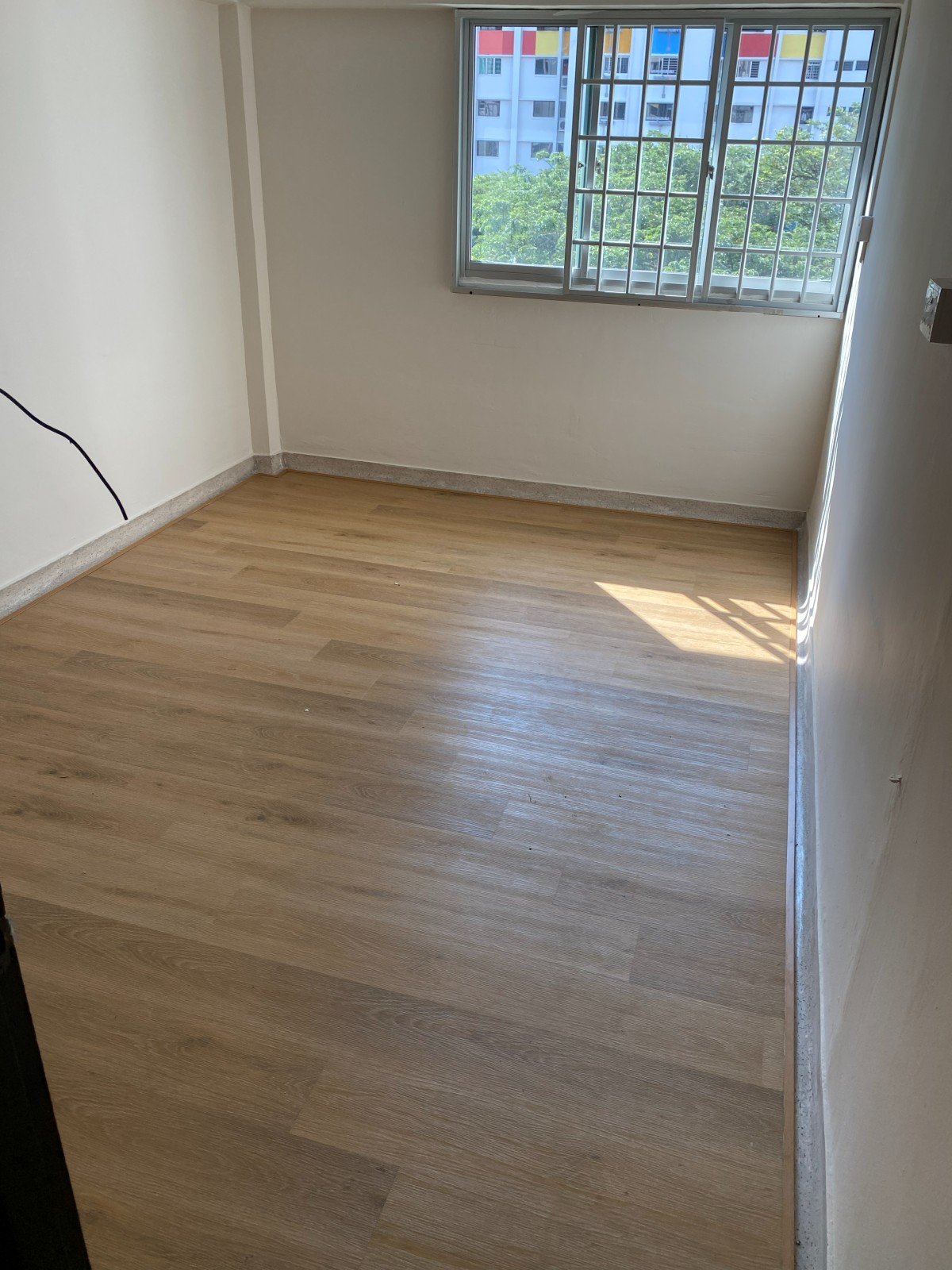 HDB bedroom with vinyl flooring