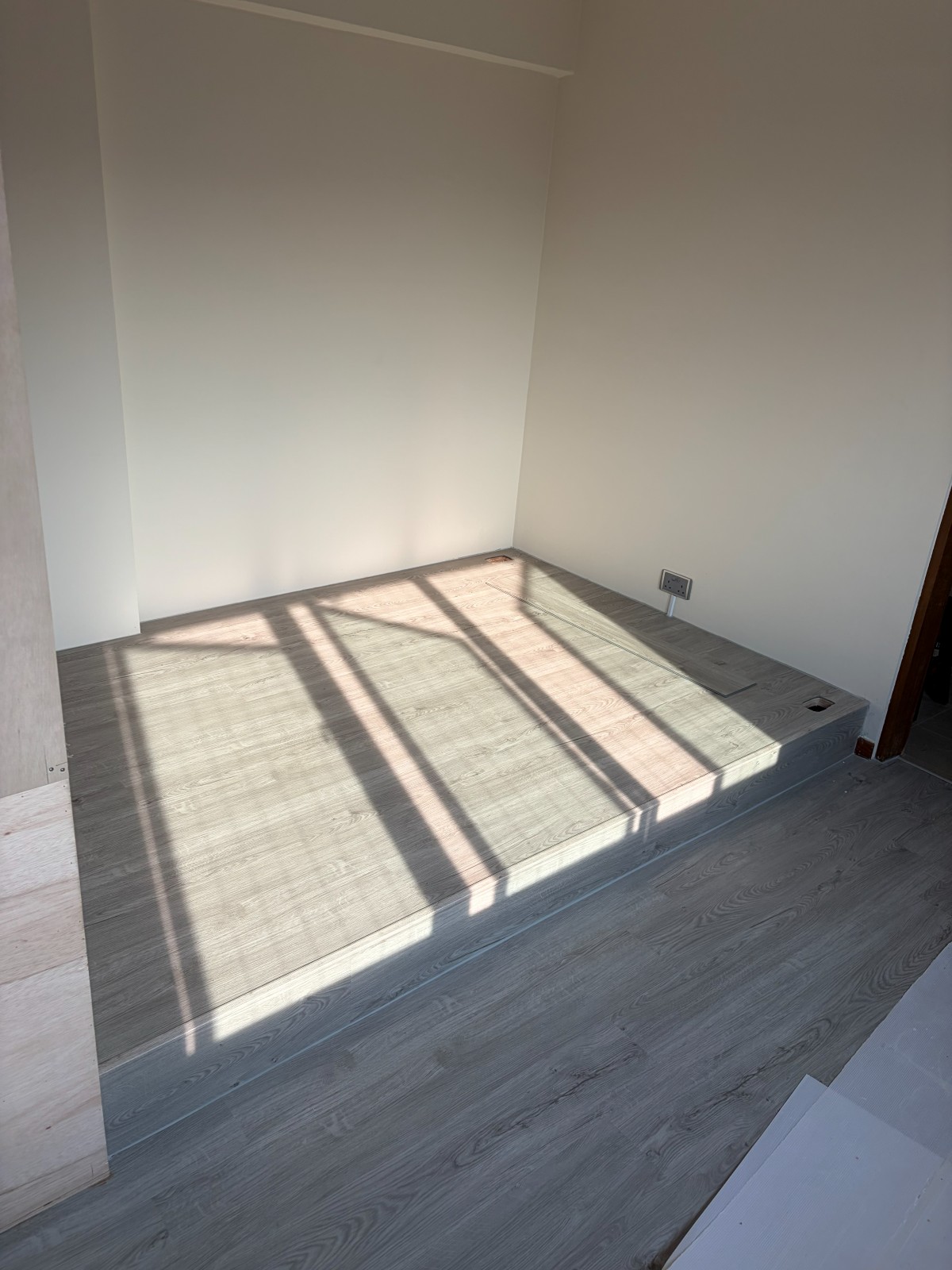 Condo bedroom platform vinyl flooring