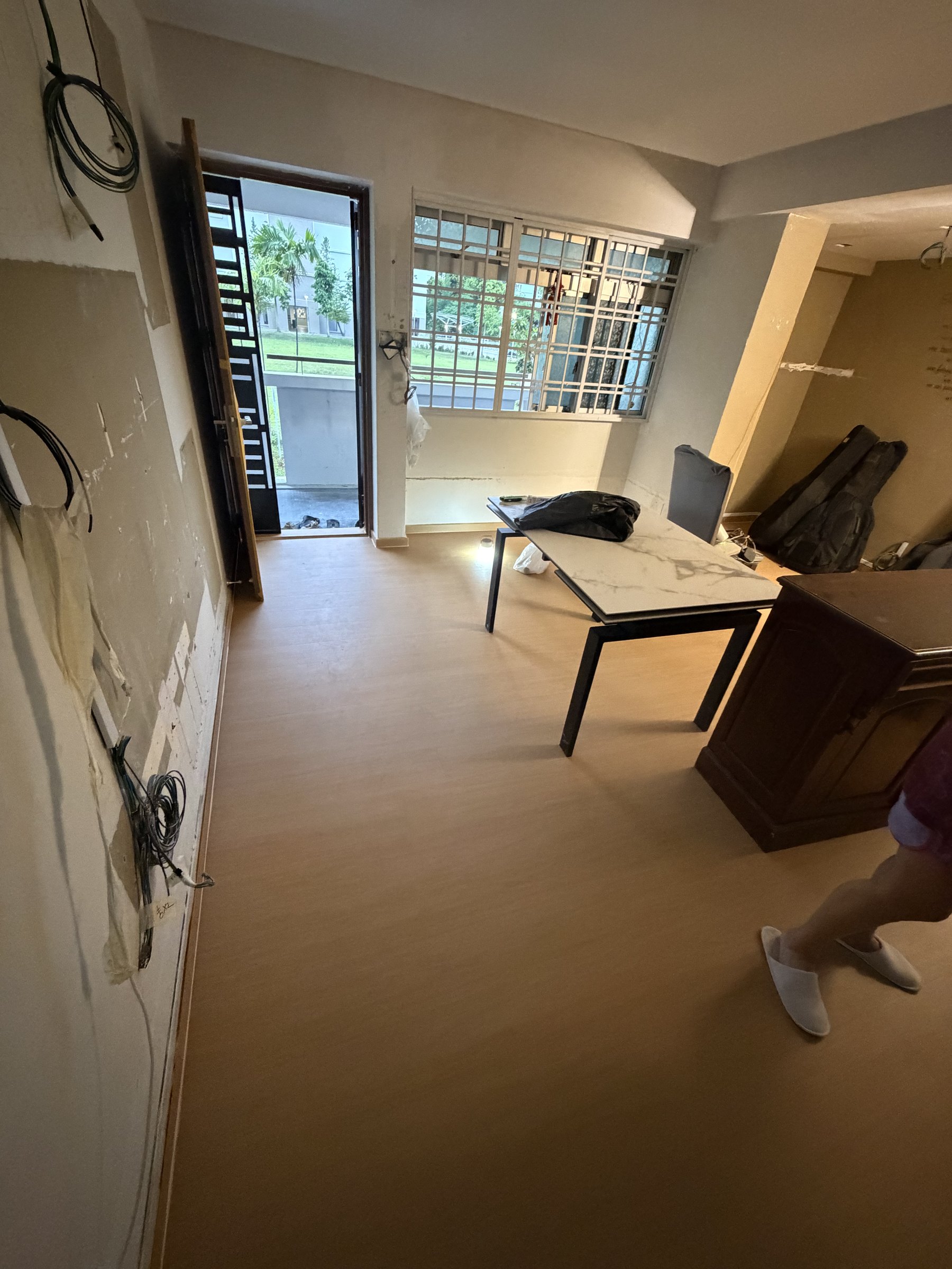 Natural oak vinyl flooring in a Singapore living area