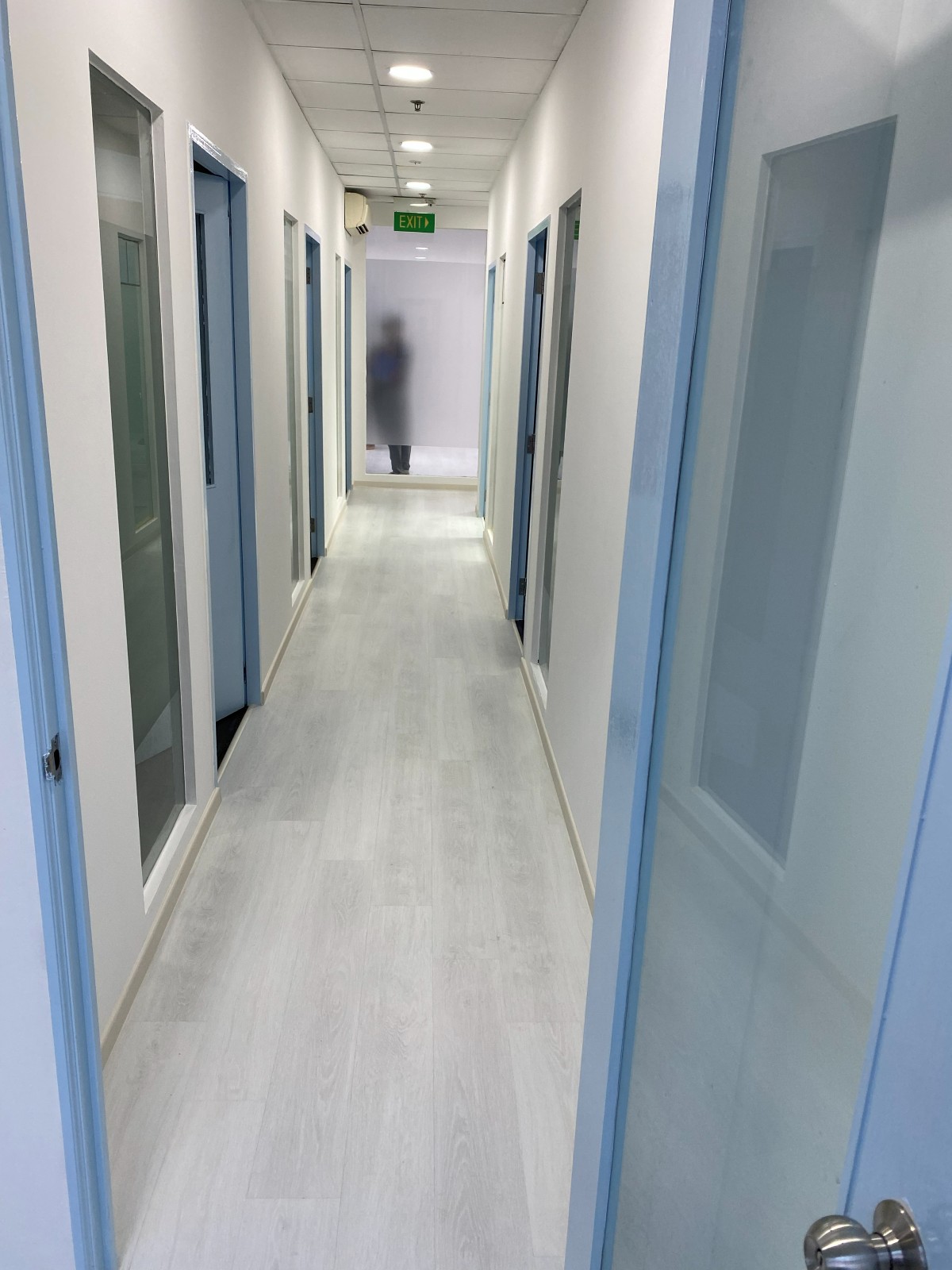 Office corridor white vinyl flooring
